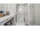 Bathroom with framed shower, vanity with mirror, and updated fixtures create a clean and functional space at 947 Weatherby Ln, Creedmoor, NC 27522