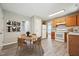 Inviting kitchen nook area, complete with breakfast table, modern decor and easy access to adjacent rooms at 105 Leacroft Way, Durham, NC 27703