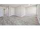 Spacious living area showcasing hard surface floors and neutral paint, creating a bright, airy ambiance at 105 Leacroft Way, Durham, NC 27703