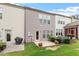 A backyard featuring a lawn, plants, and wooden deck at 107 Tuftin Dr, Durham, NC 27703