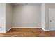 Spacious living room featuring neutral walls and wood flooring at 107 Tuftin Dr, Durham, NC 27703