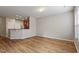 Inviting living space with seamless flow into kitchen, perfect for entertaining and modern living at 107 Tuftin Dr, Durham, NC 27703