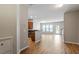 Open-concept living space with wood flooring and plenty of natural light at 107 Tuftin Dr, Durham, NC 27703