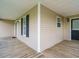 The back porch is a cozy wooden deck, featuring a combination of open space and shaded areas at 110 Westlake Dr, Wendell, NC 27591
