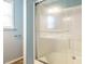 Bathroom showcasing a glass-enclosed shower with updated fixtures and tile surround at 110 Westlake Dr, Wendell, NC 27591