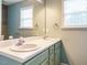 Bathroom featuring double sinks, updated fixtures and plenty of natural light at 110 Westlake Dr, Wendell, NC 27591