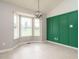 Bright dining area featuring a bay window and a modern chandelier at 110 Westlake Dr, Wendell, NC 27591