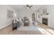 Inviting living room features comfortable seating, a fireplace, modern decor, and plenty of natural light at 1127 Timbercut Dr, Durham, NC 27703