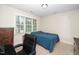 Cozy bedroom with ample natural light and neutral carpet flooring at 117 Garden Oaks Dr, Smithfield, NC 27577