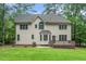 Exterior backyard showcasing lawn, patio area, deck and exterior of home at 117 Garden Oaks Dr, Smithfield, NC 27577