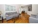Bright living room features hardwood floors, fireplace, and access to the dining room at 117 Garden Oaks Dr, Smithfield, NC 27577