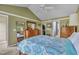 Spacious bedroom with a large wooden dresser, complemented by a mirrored closet and a bright window view at 120 Feezor Ct, Clayton, NC 27527