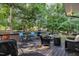 Deck area featuring a variety of seating options and natural surroundings at 120 Feezor Ct, Clayton, NC 27527