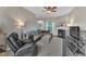 Cozy living room with a fireplace, neutral carpet, and a comfortable sectional sofa at 120 Feezor Ct, Clayton, NC 27527