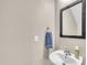 Neutral-toned powder room features sink, faucet, mirror, and a towel at 120 Feezor Ct, Clayton, NC 27527