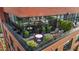 Outdoor lounge with table and chairs and landscaping on an outdoor terrace at 122 N Harrington St # 1555, Raleigh, NC 27603