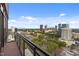 Stunning city skyline view from a private balcony with glass railings at 122 N Harrington St # 1555, Raleigh, NC 27603