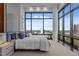 Bedroom features floor to ceiling windows with a city view at 122 N Harrington St # 1555, Raleigh, NC 27603