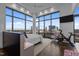 Bright bedroom featuring floor to ceiling windows and panoramic city views at 122 N Harrington St # 1555, Raleigh, NC 27603