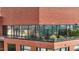Exterior view of a building's well-maintained patio, featuring modern architecture with brick finish at 122 N Harrington St # 1555, Raleigh, NC 27603