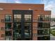 Detailed exterior view highlighting the balconies and modern windows at 122 N Harrington St # 1555, Raleigh, NC 27603