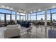 Open living room with floor-to-ceiling windows and city views at 122 N Harrington St # 1555, Raleigh, NC 27603