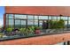 Outdoor patio with lounge seating and lush greenery, ideal for relaxation and enjoying the cityscape at 122 N Harrington St # 1555, Raleigh, NC 27603