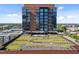 Gorgeous shot of the rooftop green space featuring a unique urban garden with panoramic city views at 122 N Harrington St # 1555, Raleigh, NC 27603