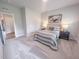 Serene bedroom featuring soft carpeting, a cozy bed, and ample natural light at 124 Sugar Run Dr # 11, Fuquay Varina, NC 27526