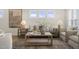 Inviting living room with stylish furniture, neutral tones, and plenty of natural light at 124 Sugar Run Dr # 11, Fuquay Varina, NC 27526