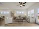 Spacious living room with contemporary furnishings, hardwood floors, and access to the outdoor deck at 124 Sugar Run Dr # 11, Fuquay Varina, NC 27526