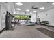 Well-equipped gym with cardio machines, weight equipment, and a bright, open layout at 1300 St Marys St # 402, Raleigh, NC 27605