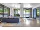 Bright lobby with a contemporary design, stylish seating, and large windows showcasing lush greenery at 1300 St Marys St # 402, Raleigh, NC 27605