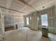 Bedroom with unfinished walls and a small heater at 155 Cherry Bark Dr, Youngsville, NC 27596