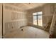 A bedroom shows drywall, a window, and new construction at 155 Cherry Bark Dr, Youngsville, NC 27596