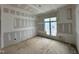 Bright bedroom with a large window and rough-in electrical work in progress at 155 Cherry Bark Dr, Youngsville, NC 27596