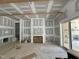 An unfinished living room with a sliding glass door at 155 Cherry Bark Dr, Youngsville, NC 27596
