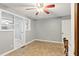 Cozy dining room with hardwood floors, ceiling fan, and access to other rooms at 16 S Church, Coats, NC 27521