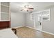 Cozy dining room with hardwood floors, ceiling fan, and built-in shelving at 16 S Church, Coats, NC 27521