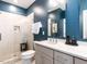 Modern bathroom features a glass shower, and neutral tones at 1610 Draper View Loop # 101, Raleigh, NC 27608