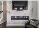 Beautiful living room with marble accent wall, fireplace, and flatscreen TV at 1610 Draper View Loop # 101, Raleigh, NC 27608