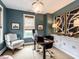 Stylish home office with custom lighting, artwork, and built-in storage solutions at 1610 Draper View Loop # 101, Raleigh, NC 27608