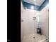 A tiled shower showcases a glass door, a rain shower head, and a built-in niche at 1610 Draper View Loop # 101, Raleigh, NC 27608