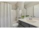 Cozy bathroom featuring a shower-tub combo, vanity, and mirror at 1625 Banks View Dr, Raleigh, NC 27603
