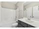 Bathroom featuring a shower and tub, a single sink vanity, and tile flooring at 1625 Banks View Dr, Raleigh, NC 27603