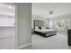 Primary bedroom features a walk-in closet, neutral paint, carpet and plenty of natural light at 1625 Banks View Dr, Raleigh, NC 27603