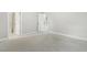 Neutral bedroom with carpet, white trim, and an open doorway to the hall at 1625 Banks View Dr, Raleigh, NC 27603