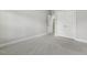 Bright bedroom with carpet and an open closet door with an en-suite bathroom at 1625 Banks View Dr, Raleigh, NC 27603