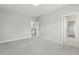 Neutral bedroom features an open doorway and ample space at 1625 Banks View Dr, Raleigh, NC 27603
