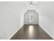 Light filled bonus room with wood floors, a ceiling fan, and natural light from a window at 1625 Banks View Dr, Raleigh, NC 27603